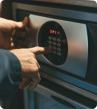 adult-man-in-blue-jacket-uses-safe-in-the-hotel-ro-2026-01-05-06-00-53-utc 1